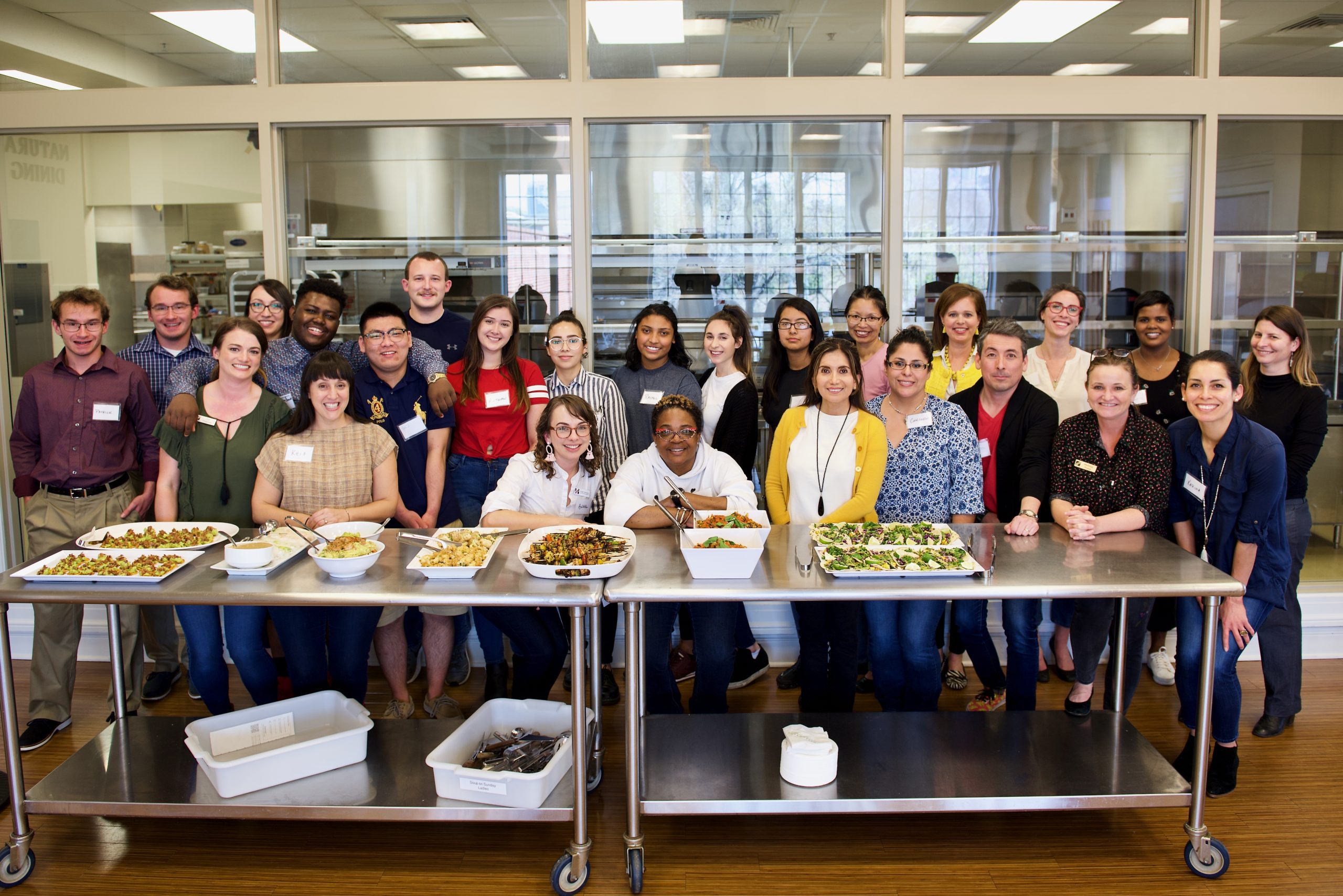 Participants share food they prepared together as part of the community building process.